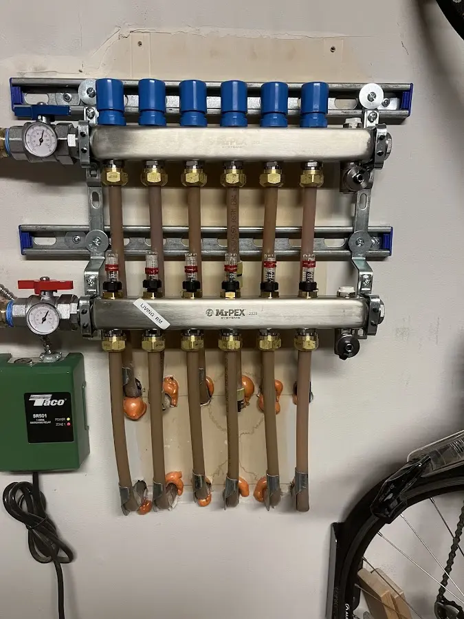 Plumber performing Water Heater Repair at a residential property in Osceola